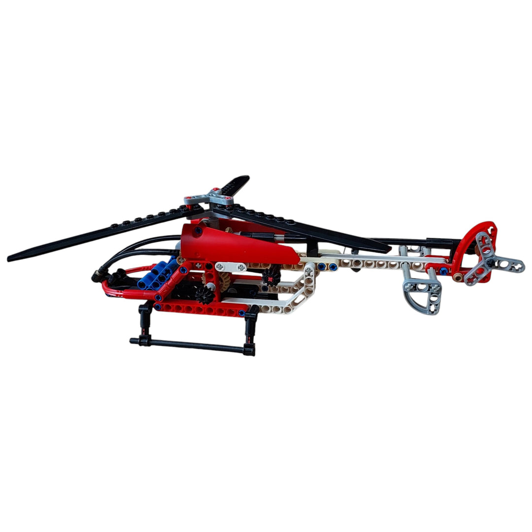 Lego, Turn the gear wheel on this realistic helicopter model to make the main and tail rotors spin together, while another gear operates the working winch to lift heavy loads. You can even rebuild it into a seaplane for even more functional LEGO Technic fun.