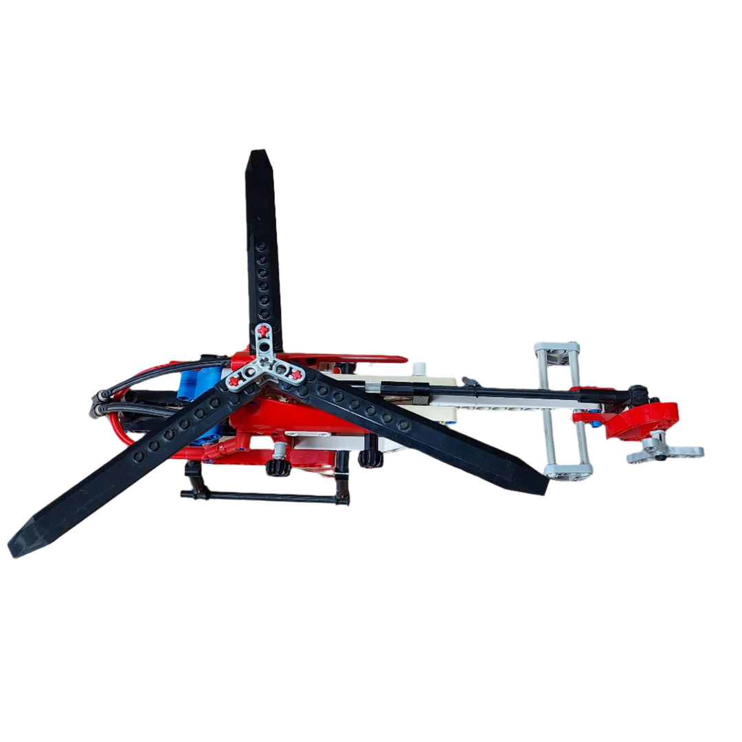 Lego, Turn the gear wheel on this realistic helicopter model to make the main and tail rotors spin together, while another gear operates the working winch to lift heavy loads. You can even rebuild it into a seaplane for even more functional LEGO Technic fun.