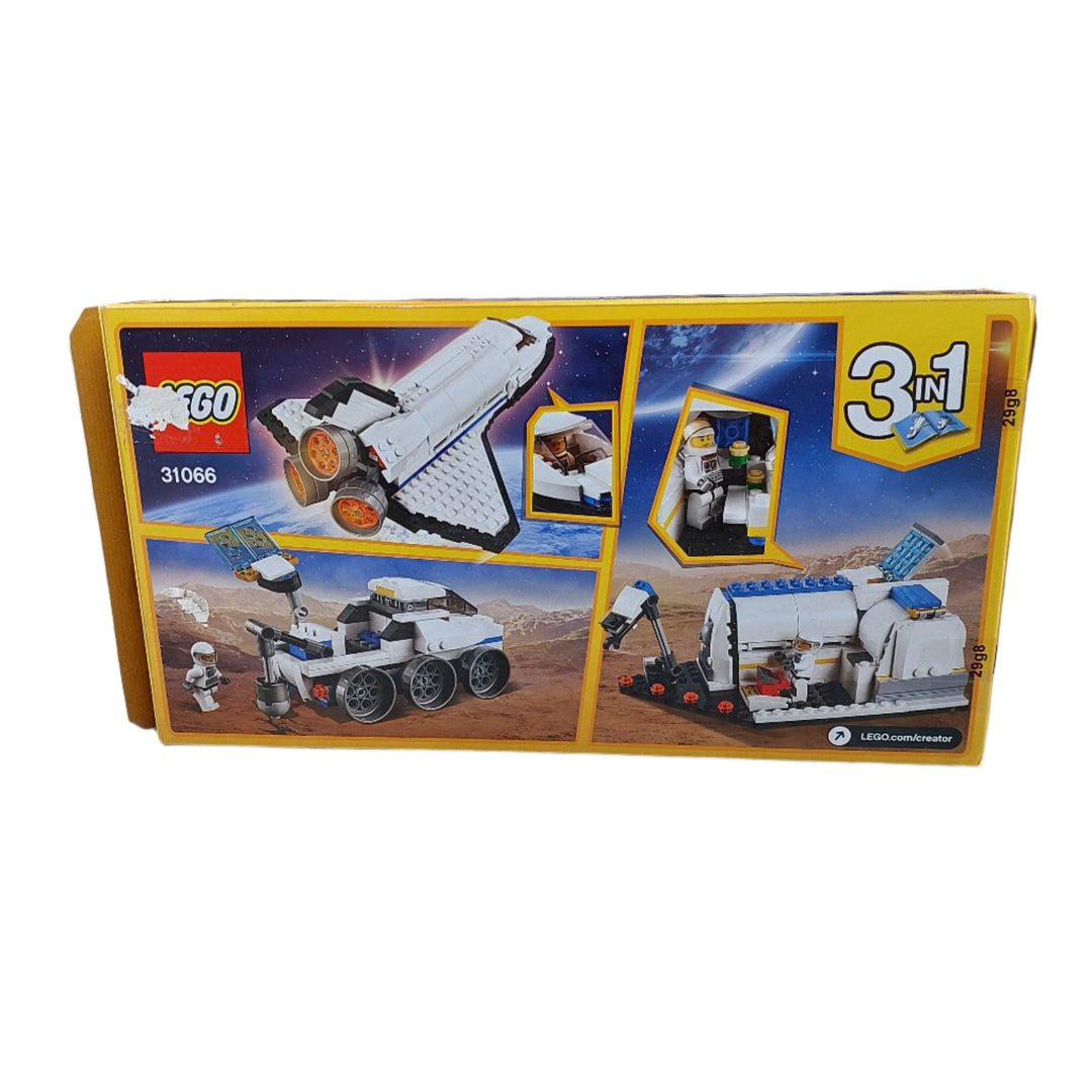 Lego, Carry out daring space missions with the Space Shuttle Explorer, featuring an authentic white, black and gray color scheme, large engines, opening payload bay with robotic arm, satellite with foldout wings and a minifigure cockpit with tinted canopy. This 3-in-1 LEGO Creator model rebuilds into a Moon Station or a Space Rover for further outer‑space adventures. Also includes a minifigure.