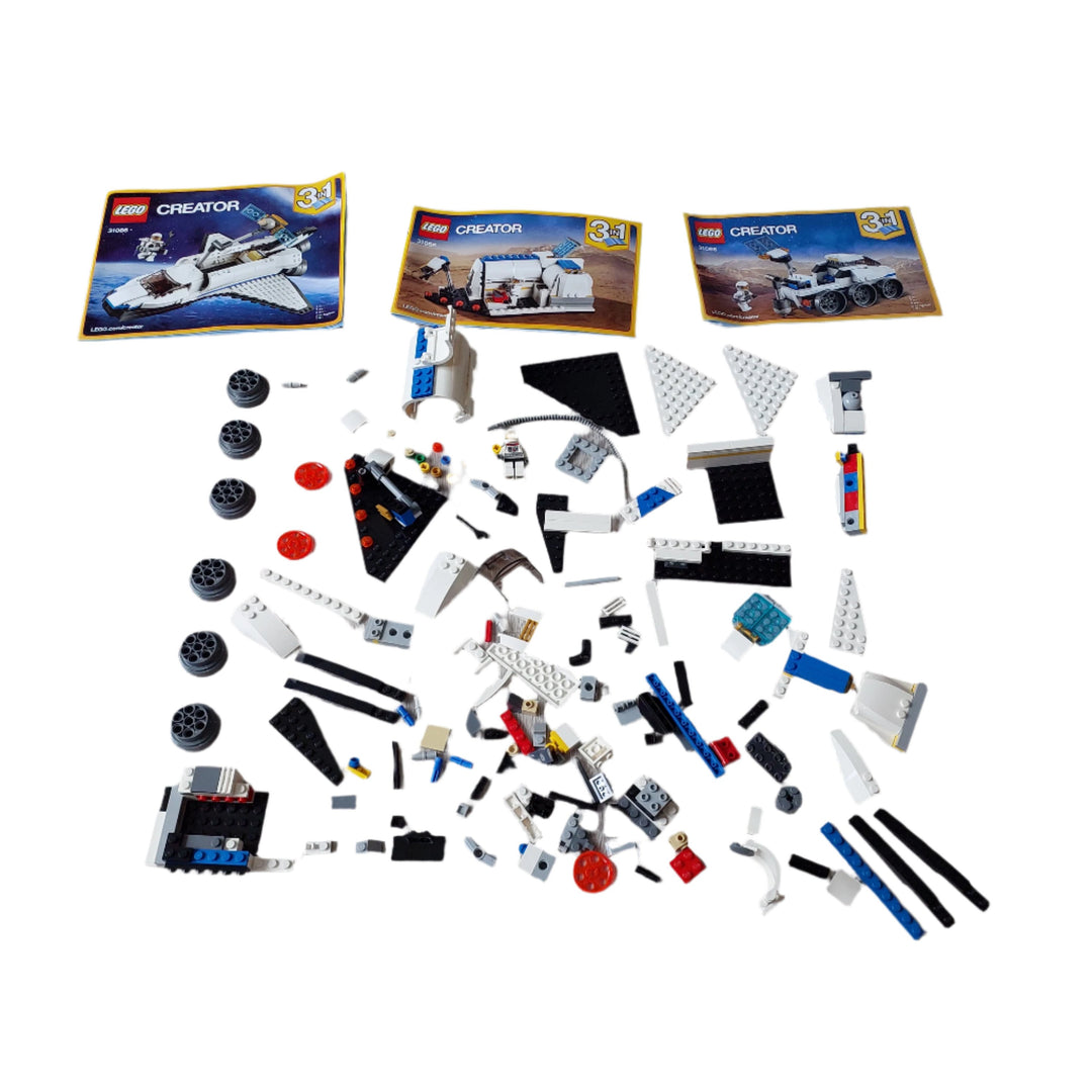 Lego, Carry out daring space missions with the Space Shuttle Explorer, featuring an authentic white, black and gray color scheme, large engines, opening payload bay with robotic arm, satellite with foldout wings and a minifigure cockpit with tinted canopy. This 3-in-1 LEGO Creator model rebuilds into a Moon Station or a Space Rover for further outer‑space adventures. Also includes a minifigure.