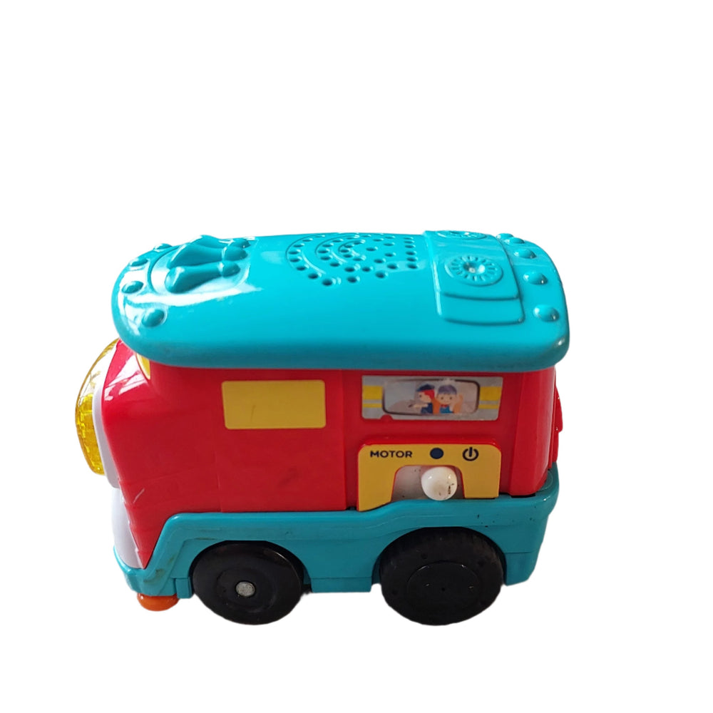 Vtech, Freight Train, Fred the motorized Go! Go! Smart Wheels Freight Train by VTech loves chugging along with heavy cargo. Your little conductor can press the light-up button to hear sing-along songs and learn the letter “F” or push him along to play cheerful melodies and sound effects. Pretend to fill up the detachable tanker car by spinning the tanker's drum to develop motor skills. This cute little train also responds to SmartPoint locations on Go! Go! Smart Wheels playsets (sold separately) with fun ph