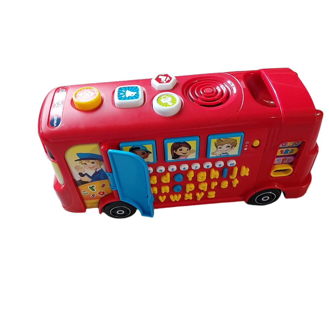 Vtech, Playtime Bus, The Playtime Bus features four fun activities to help your child learn a range of subjects! Climb aboard for a fun learning journey with the VTech Playtime Bus! Through over 100 interactive curriculum questions, your child can learn phonic sounds, letters, vocabulary, numbers, counting, and safety rules; also includes a quiz mode to reinforce learning. Features over 30 lively melodies, songs, and fun bus-related sounds effects, 26 letter buttons, 1–10 number buttons, brake, horn and dri