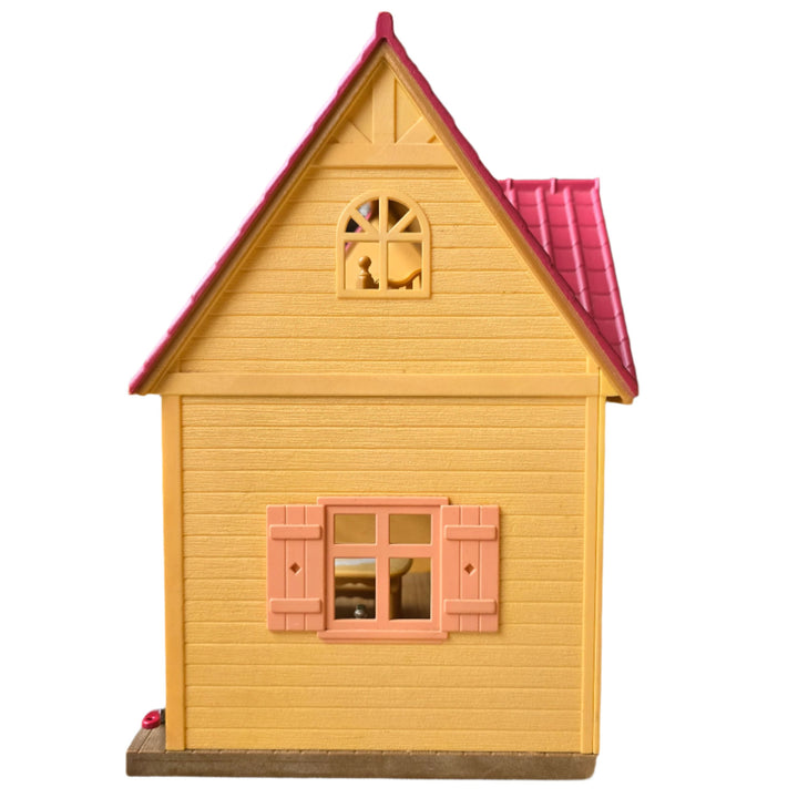 Sylvanian Families, The Cosy Cottage is the perfect choice those starting out with Sylvanian Families. With its red roof and beige brick style exterior, this quaint two floor cottage includes a ladder to connect the upstairs and downstairs.