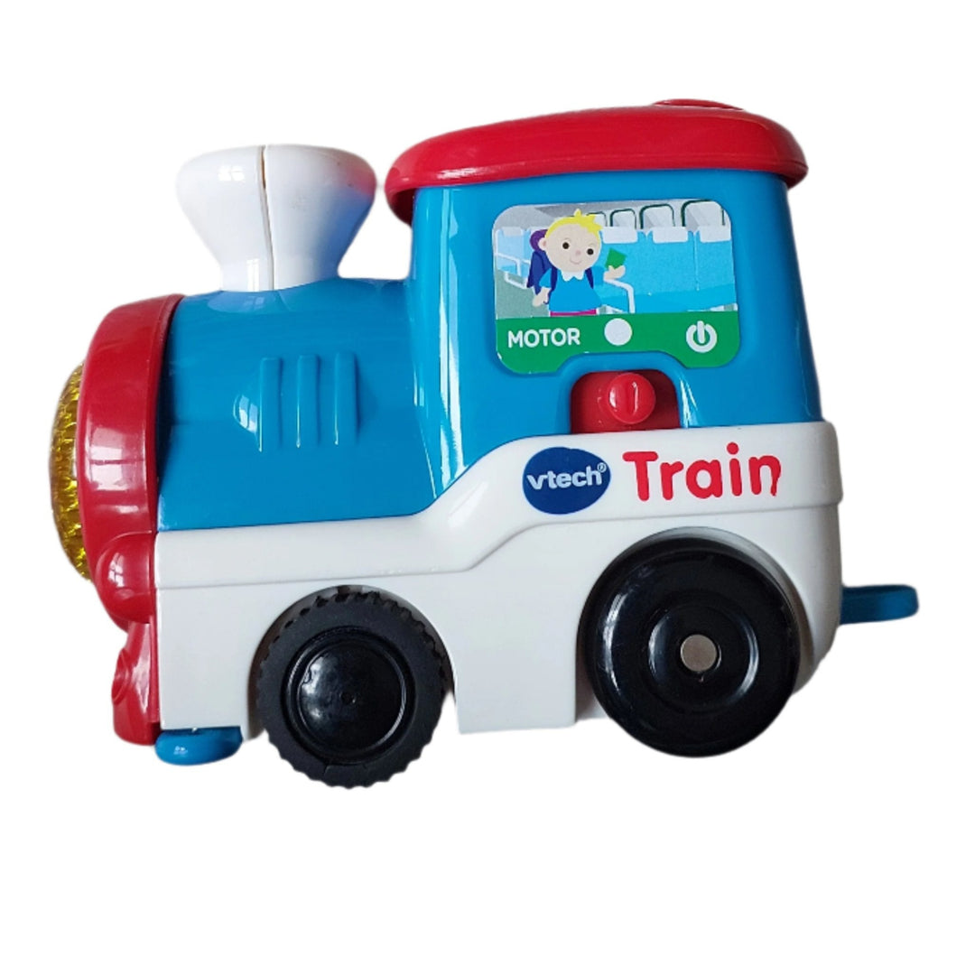 Vtech, Smart Wheels Choo Choo Train Playset, The Go! Go! Smart Wheels Choo-Choo Train Play set from VTech features a motorized train engine that responds with sounds and phrases when crossing over Smart Point locations along the tracks. Your child can arrange the track pieces in a variety of different ways and then watch as the motorized train engine chugs into the tunnel or through the gate.