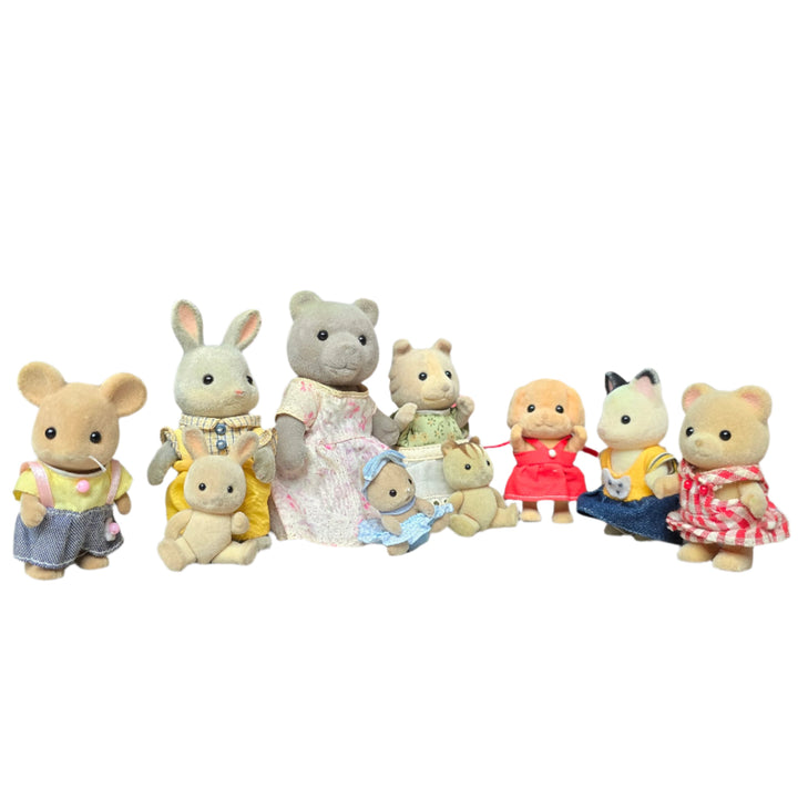 Assorted Sylvanian Families Dolls and Clothes