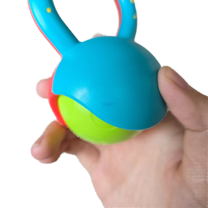 Halilit, Roller Ball, A tactile rolling ball which makes a delightful shaker sound and features a textured grip perfect for small hands. This delightful musical toy helps develop creativity, motor skills, hand-eye co-ordination and teaches cause and effect.