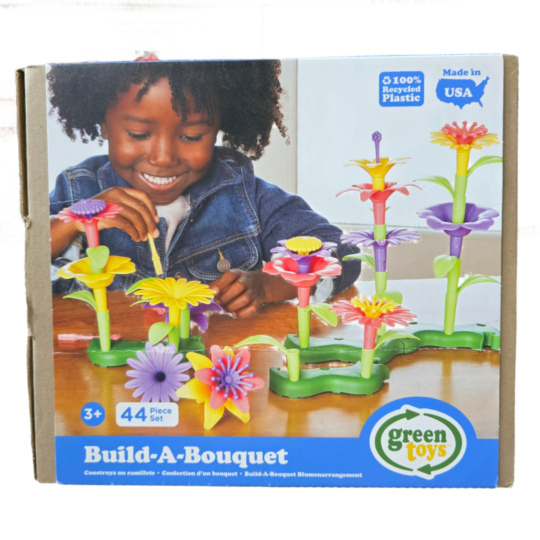 Green Toys, Build-A-Bouquet, Talk about flower power! Budding florists can create countless flower arrangements with the Green Toys Build a Bouquet set, sparking hours of creative fun. This colourful 44 piece set includes 4 bases, 16 stem and leaf pieces and 24 flower pieces including vibrant lilies, petunias and daisies. The flower pieces stack interchangeably in the assorted stems, providing limitless fun that blossoms in all seasons.