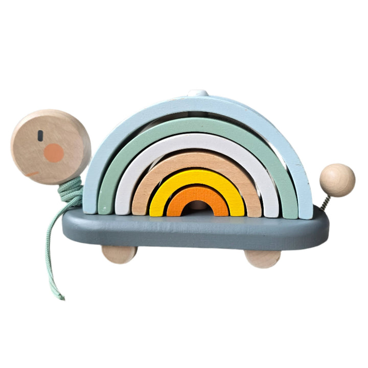 Janod, This cute turtle will become your child's new best friend; they will love walking it everywhere whilst developing their motor skills. This wooden turtle is a 2-in-1 early-learning toy: a pull-along toy with subtle yet trendy colours that also serves as an original construction game! The shell of the turtle is made up of 6 arches that can be stacked at will, allowing babies aged 12 months and up to handle and grasp hold of the rounded shapes.