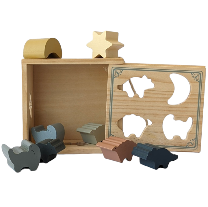 Konges & Sløjd, Dino Shape Sorter, Cognitive & Motor Skills, Shape sorter made in 100 percent sustainable wood. Designed with a cotton string handle.