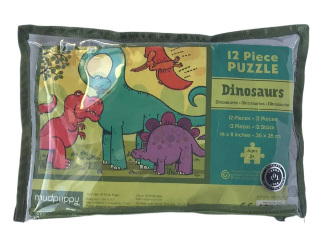 Mudpuppy, Mudpuppy Mighty Dinosaurs Pouch Puzzle, 12 Extra Thick Colorful Pieces, The 12-piece Mighty Dinosaurs jigsaw puzzle is perfect for children ages 3 and older. The big pieces are extra thick and sturdy, easy for small hands to manipulate. The finished puzzle measures 14” x 11” and is phthalate free.