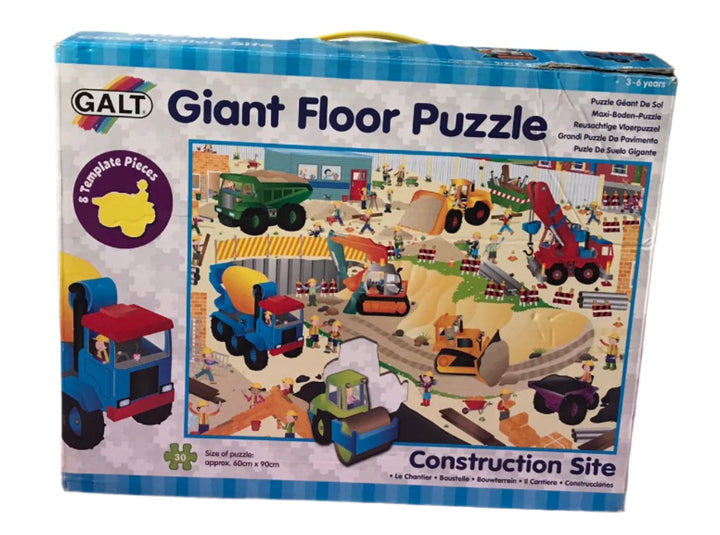 Galt, Galt A1013K Toys, Giant Floor Puzzle - Construction Site, Beautifully illustrated floor puzzle with 30 pieces including 8 templates, cut in the shape of the construction vehicles. There are so many interesting things to find in this puzzle that children will return to it time and time again. The large, easy to handle pieces are made in thick board with a wipe-clean surface.