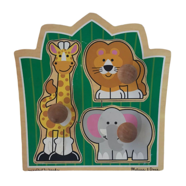 Melissa and doug, Melissa & Doug 3375 Jungle Friends Safari Animals Jumbo Knob Wooden Puzzle, Standing against a lush green background, a lion, an elephant and a giraffe are waiting to play. Extra thick wooden puzzle includes three pieces, with jumbo wooden knobs for easy grasping. Full-color, matching pictures appear underneath each piece. Encourage eye-hand, fine motor and visual perception skills.