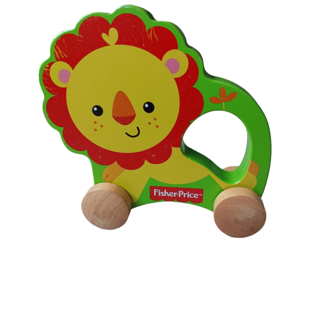 Fisher Price, My First Lion On Wheels, A wooden rolling lion pulled with string, this little lion on wheels is made of solid wood. For ages 12 months and above.