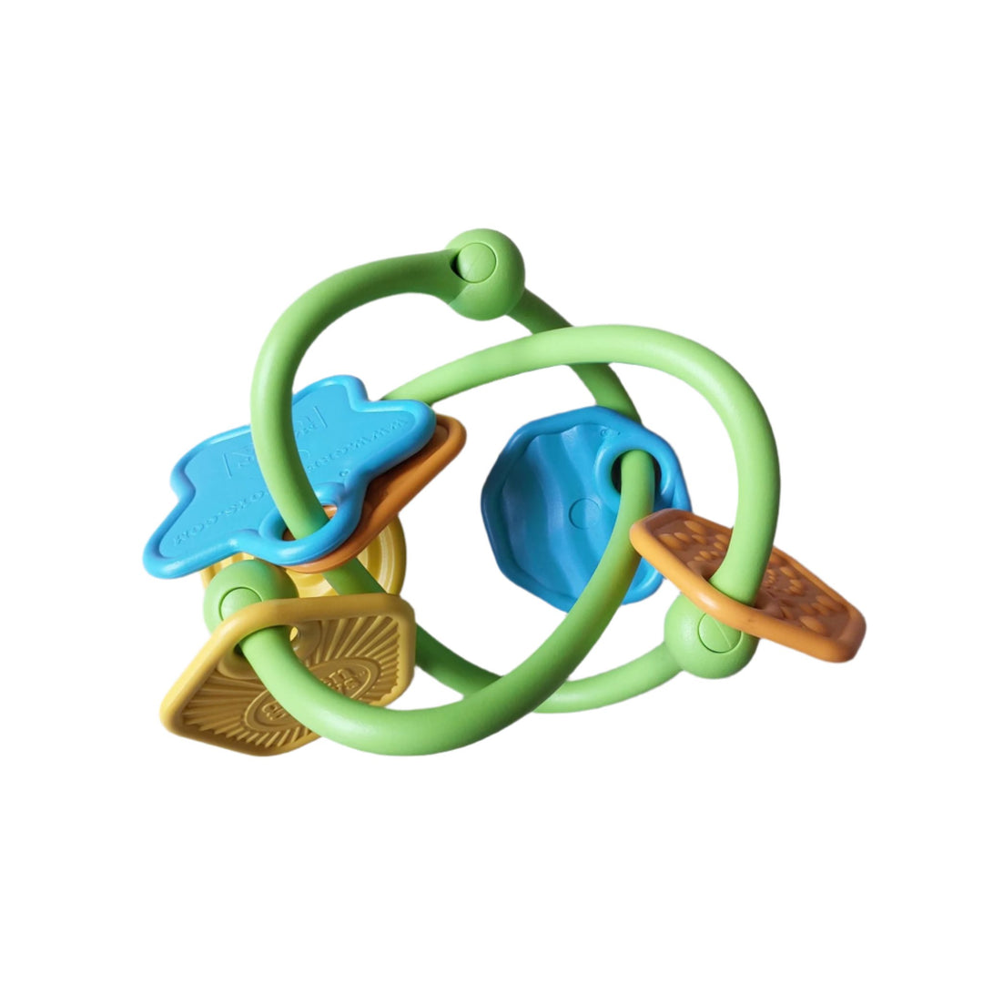 Green Toys, Twist Teether, Shake, rattle and explore with the my first Green Toys Twist Teether. Tiny hands can easily grasp this lightweight, three dimensional, ultra-safe teether. Each uniquely shaped and colorful charm has a distinct texture to stimulate visual and tactile senses.
