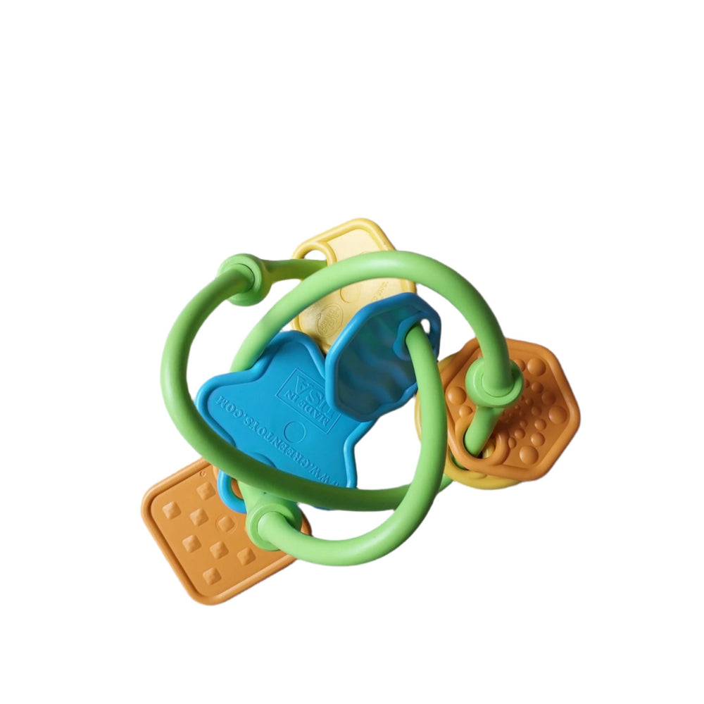 Green Toys, Twist Teether, Shake, rattle and explore with the my first Green Toys Twist Teether. Tiny hands can easily grasp this lightweight, three dimensional, ultra-safe teether. Each uniquely shaped and colorful charm has a distinct texture to stimulate visual and tactile senses.