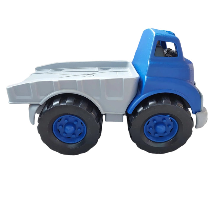 Green Toys, Flatbed Truck, The Green Toys Flatbed Truck with Race Car is on the move. This sturdy blue truck hauls our sleek red hot rod on its back, and has a flatbed that tilts up to allow the car to roll off. These eco-conscious vehicles are made in the USA from 100% recycled plastic milk containers that save energy and reduce greenhouse gas emissions. 