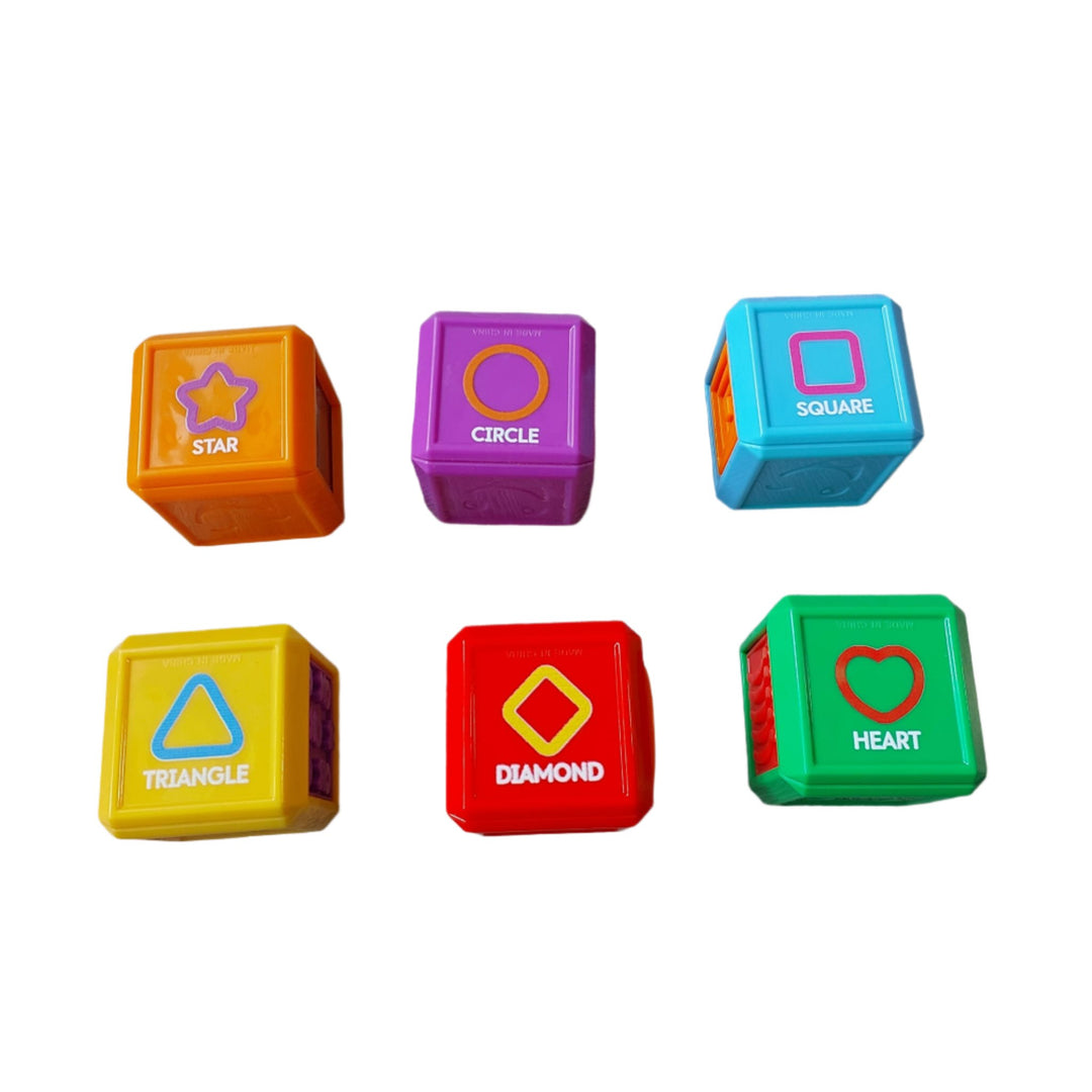 Fisher Price, Laugh & Learn First Words Shape Blocks, Build your little one's vocabulary with this pack of six colorful blocks that help teach your baby familiar and advanced shapes and first words! With six sides of sensory play and a variety of hands-on activities, these blocks keep little hands (and minds) working all day. Bring the blocks over to the Laugh & Learn First Words Smart Puppy (sold separately) to hear phrases and sounds that advance with each Smart Stages level, helping to build the connecti