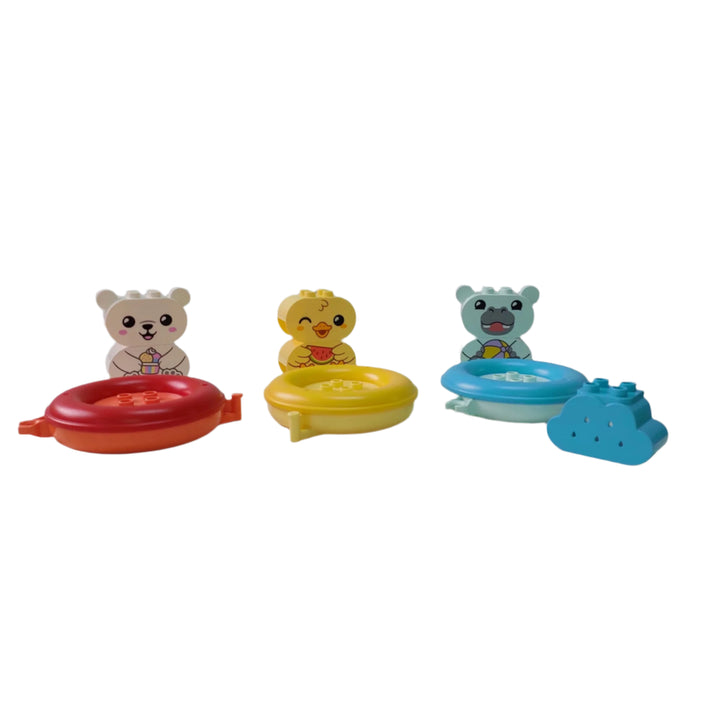 Lego, My First Bath Time Fun Floating Train, LEGO DUPLO For preschoolers 18 months and older, the easy-to-clean developmental bath toy Floating Animal Train (10965) is perfect for their first bath experience. These adorable hippo, duck, and polar bear will make bath time entertaining for your toddler. The three animals are seated in attachable, floating rings of varying colours. There's a rain-producing cloud and a bucket for cleaning the animals. Children can easily connect and disconnect the rings thanks 