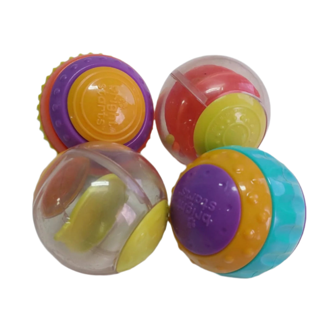 Bright Starts, Bright Starts Shake & Spin Activity Balls Toy, Sized perfectly for little hands, these baby toys encourage the development of fine motor skills as your littlest love engages with each one. Watch baby shake the rattle toy to get the colorful beads down the spiral.