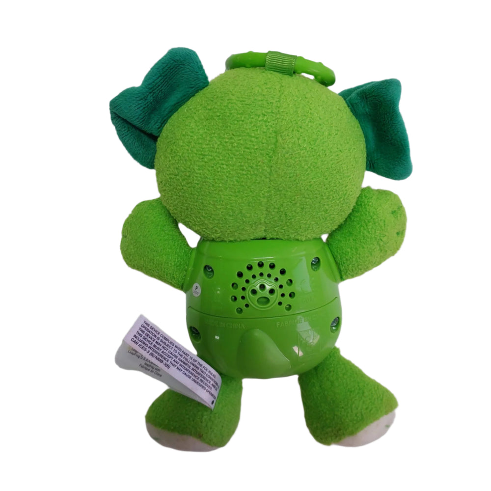 Leap Frog, Sing & Snuggle Scout, Your favorite friend is ready for learning on the go. Sing & snuggle Scout is a plush interactive puppy that talks and sings. Press the light-up button in the middle of his tummy to hear Scout bark and tell you how much he loves you. Then, press the colorful buttons to hear lullabies and learning songs about shapes, colors and letters.