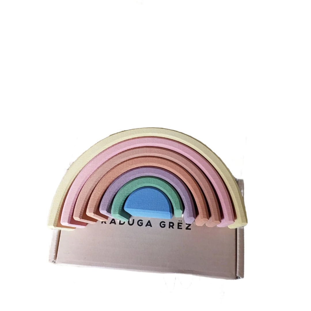 Raduga Grez, Pastel Earth Arch Stacker, The pastel earth rainbow stacking toy is hand-made by Raduga Grez; a family-run company that makes solid wood toys with the aim of 'celebrating creativity'. Their toys are loved by children and adults alike.