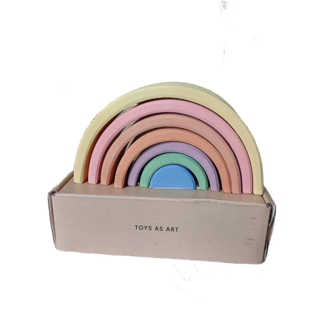 Raduga Grez, Pastel Earth Arch Stacker, The pastel earth rainbow stacking toy is hand-made by Raduga Grez; a family-run company that makes solid wood toys with the aim of 'celebrating creativity'. Their toys are loved by children and adults alike.