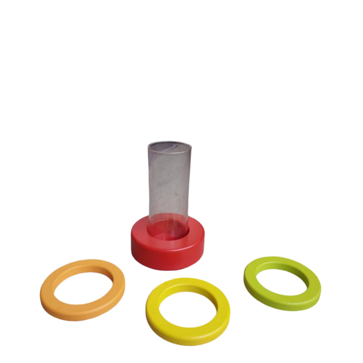 Lovevery, Clear Tube With Stacking Rings (Explorer Play Kit), This colorful toy is designed to teach ring stacking, containment and problem-solving. From the Lovevery Explorer Play Kit.