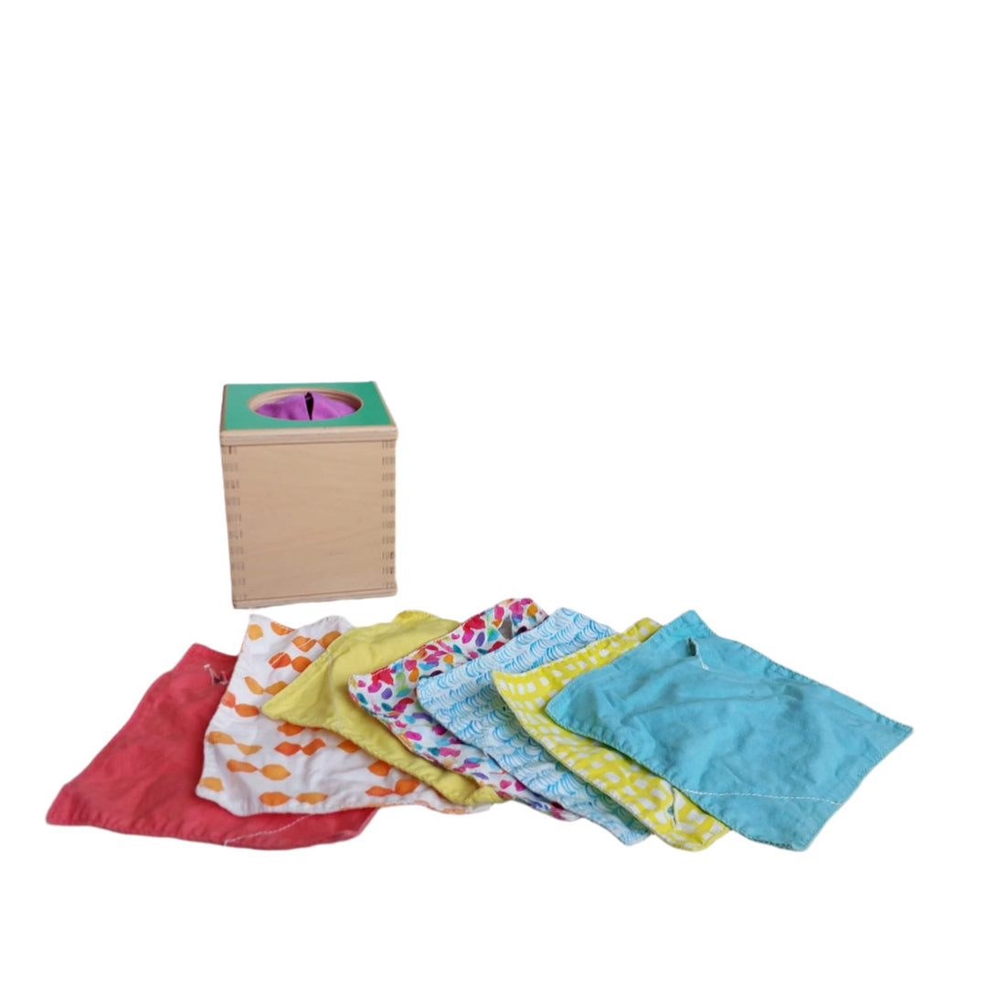 Lovevery, Magic Tissue Box (Senser Play Kit), Babies love to pull tissues out and put them back in as they explore containment.