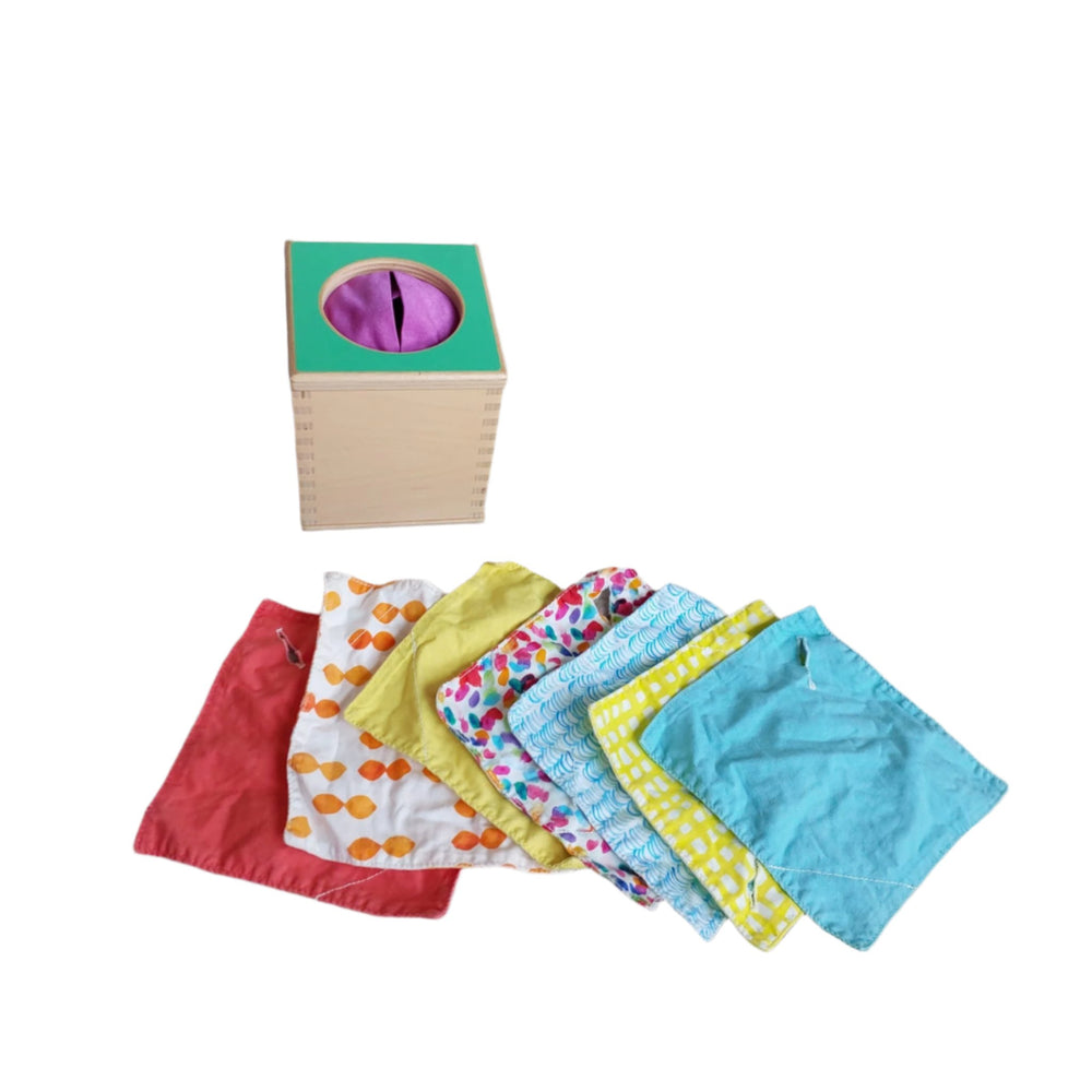 Lovevery, Magic Tissue Box (Senser Play Kit), Babies love to pull tissues out and put them back in as they explore containment.