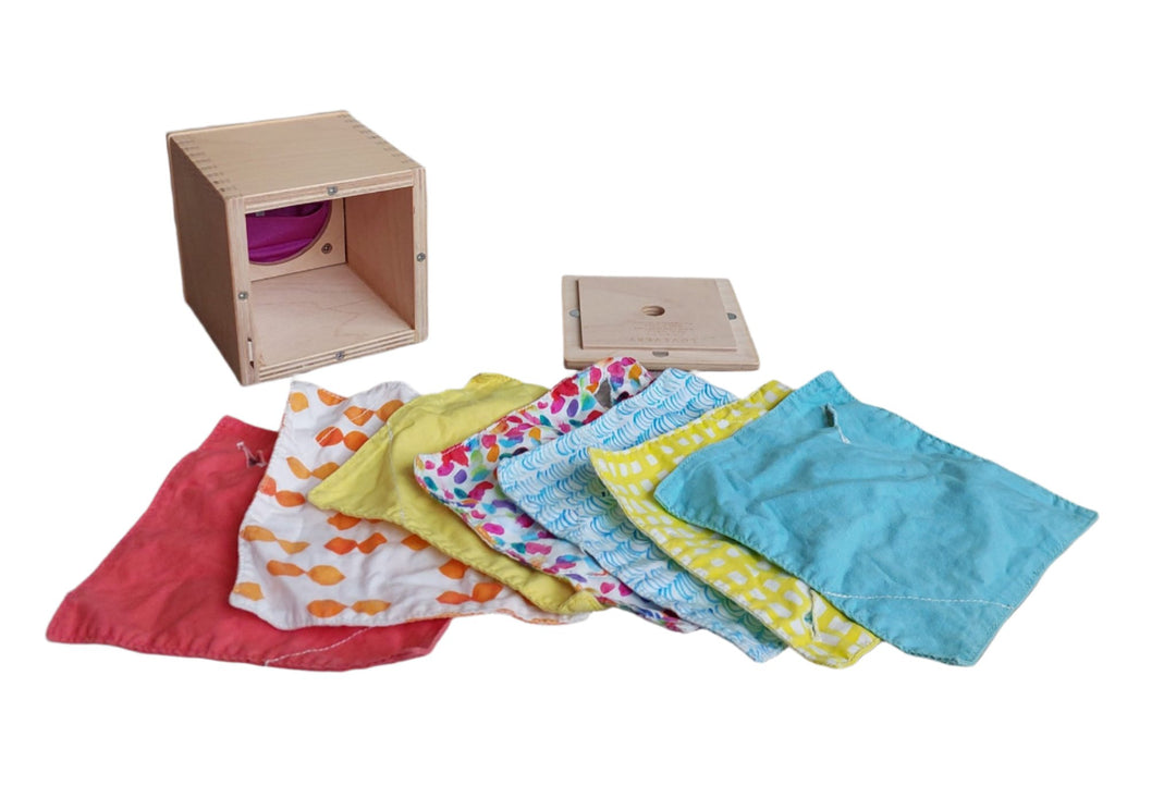 Lovevery, Magic Tissue Box (Senser Play Kit), Babies love to pull tissues out and put them back in as they explore containment.