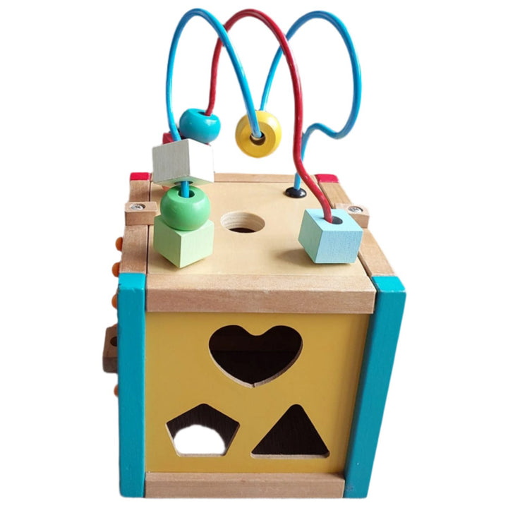 ELC, Early Learning Centre Mini Wooden Activity Cube, The Mini Wooden Activity Cube features vibrant colors and five activities. This classic wooden toy is perfect for fine motor skills, hand-eye coordination, and problem solving and is filled with early learning opportunities. The interactive features help little fingers get nimble for dressing, drawing, and writing, boosts your child’s reactions, and encourages your child to think creatively.