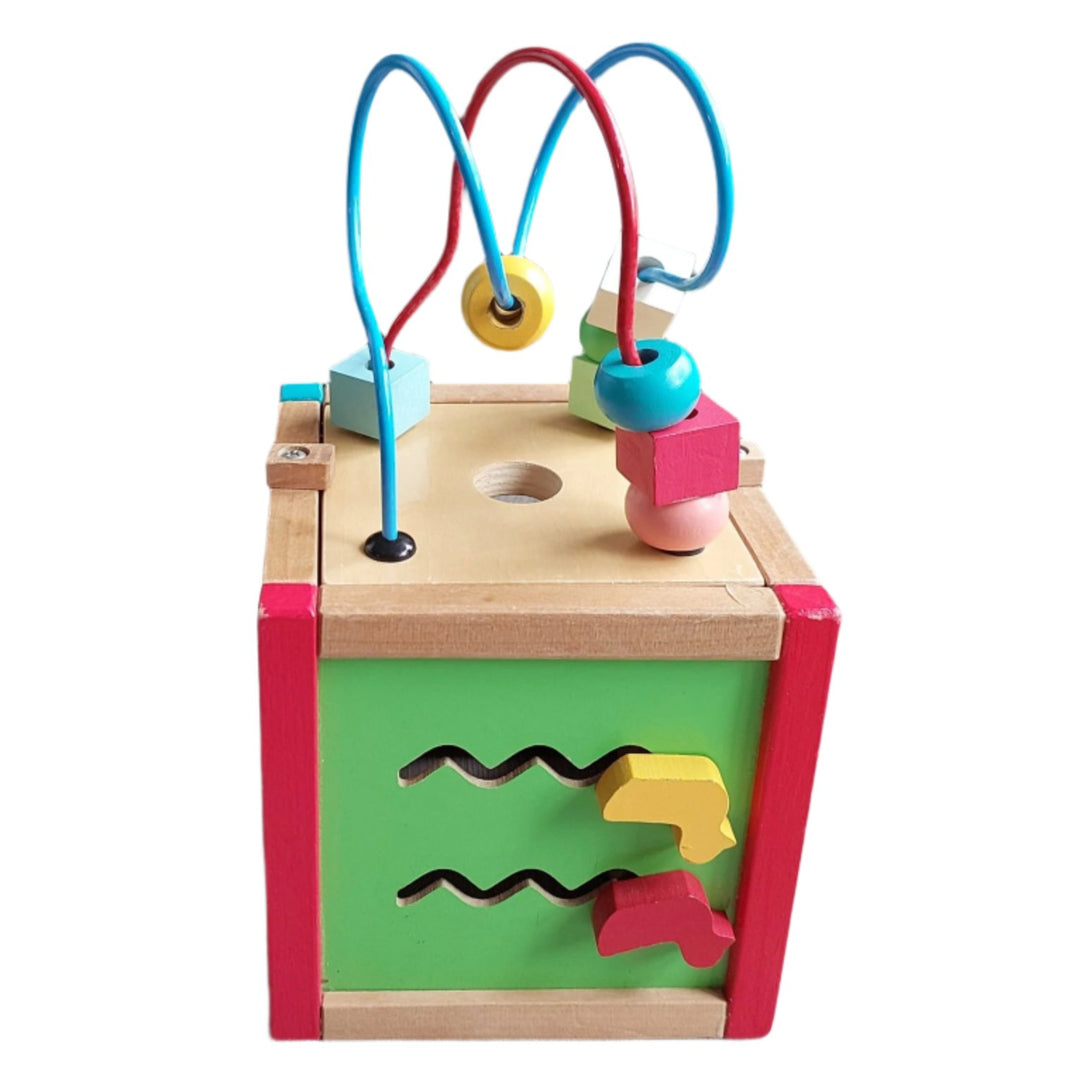 ELC, Early Learning Centre Mini Wooden Activity Cube, The Mini Wooden Activity Cube features vibrant colors and five activities. This classic wooden toy is perfect for fine motor skills, hand-eye coordination, and problem solving and is filled with early learning opportunities. The interactive features help little fingers get nimble for dressing, drawing, and writing, boosts your child’s reactions, and encourages your child to think creatively.