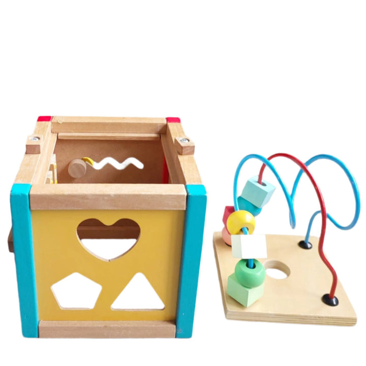 ELC, Early Learning Centre Mini Wooden Activity Cube, The Mini Wooden Activity Cube features vibrant colors and five activities. This classic wooden toy is perfect for fine motor skills, hand-eye coordination, and problem solving and is filled with early learning opportunities. The interactive features help little fingers get nimble for dressing, drawing, and writing, boosts your child’s reactions, and encourages your child to think creatively.