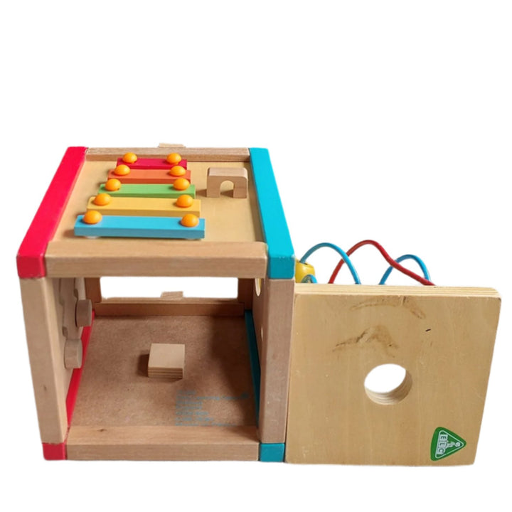 ELC, Early Learning Centre Mini Wooden Activity Cube, The Mini Wooden Activity Cube features vibrant colors and five activities. This classic wooden toy is perfect for fine motor skills, hand-eye coordination, and problem solving and is filled with early learning opportunities. The interactive features help little fingers get nimble for dressing, drawing, and writing, boosts your child’s reactions, and encourages your child to think creatively.