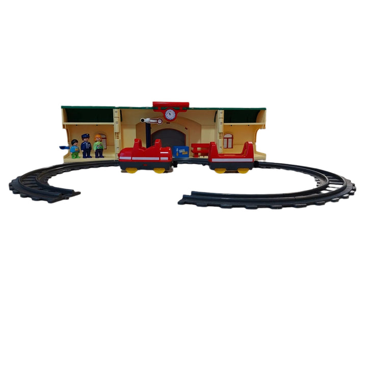 Playmobil, 6783 Take Along Train Set, All aboard! Cruise down the tracks on the My Take Along Train, With a bright and colorful design and large, rounded pieces, this Playmobil 1.2.3 set is ideal for toddlers, Train station doubles as a carrying case, making it the perfect set for toddlers on the go, Simply unlatch the side to reveal storage space for the three figures, two train cars, tracks, bench, suitcase, and traffic sign, Encourages children to explore and learn while having fun.