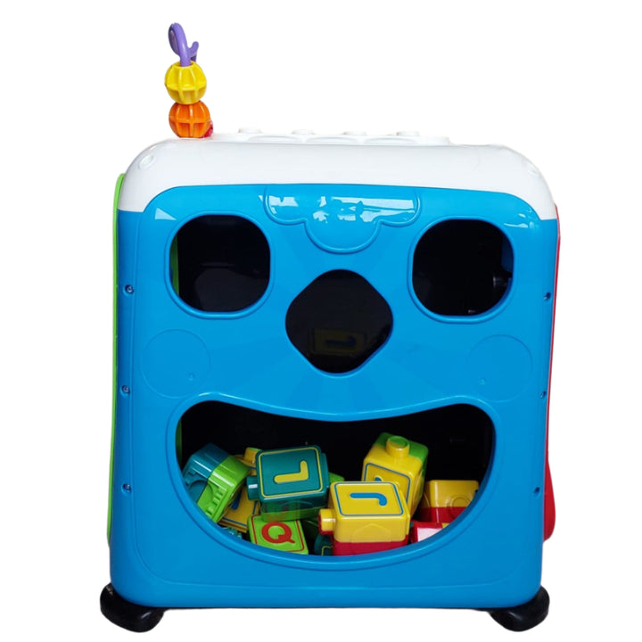 Vtech, Alphabet Activity Cube, The Alphabet Activity Cube by VTech is an interactive learning cube that has five sides of fun to discover! Little builders will love the 13 building blocks that also teach the alphabet. The blocks can be stacked on the top of the cube or they can be inserted into the slot on the electronic side to learn more about each letter. The electronic side also features five piano keys, a number keypad, and telephone. Other sides of this electronic learning toy feature fun mechanical e