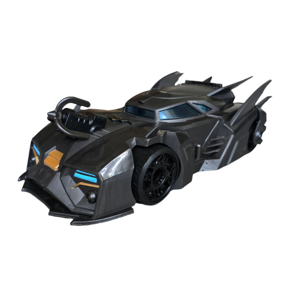 DC Comics, Make room for the Crusader Batmobile. With Batman as a 10-centimetre figure at the wheel, the sleek, pilotless car races through the streets of Gotham City in search of villains. Joker, Sharkman and Mr. Freeze are included in the set as cardboard figures.