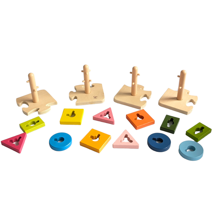 Hape, Creative Peg Puzzles, Cognitive & Motor Skills Development, Practice basic shape and color recognition with this best-selling, innovatively designed toy from Hape! The Creative Peg Puzzle has grooved shapes and pegged posts, adding an extra dimension of challenge to this colorful puzzle, and providing children hours of entertainment. Join the four puzzle bases together and then twist the variously shaped and colored puzzle pieces onto the posts. 