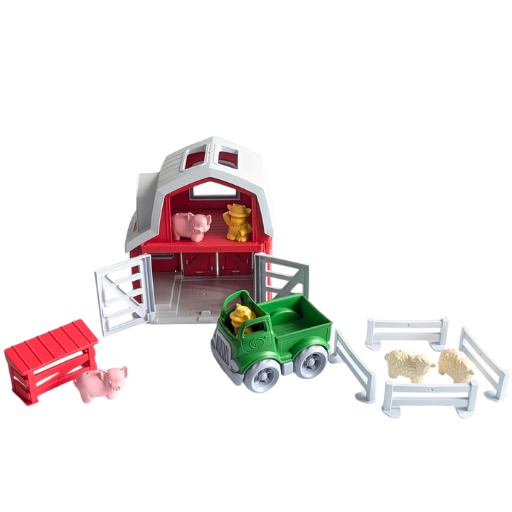 Green Toys, Farm Playset, Creative & Imaginative Play, Little ones engage in cooperative, interactive play while developing fine motor skills and coordination as they assist the farmer cows in opening and closing the barn doors, herding the pigs, and loading the sheep onto the pick-up truck. The integrated handle makes it simple to transport all the excitement on the road, and everything fits within the barn for easy cleanup and storage.