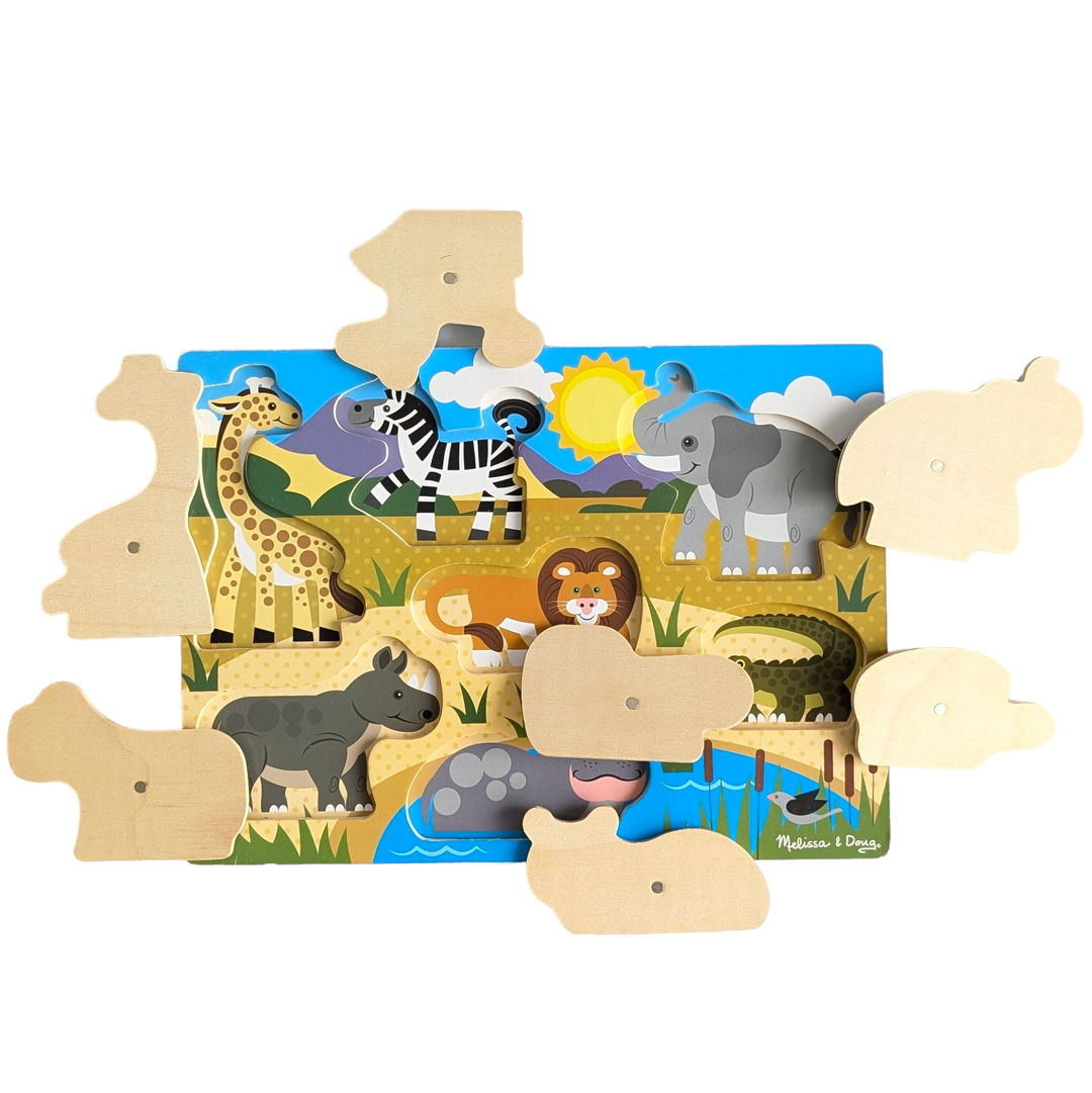 Melissa & Doug, Safari Wooden Peg Puzzle, Cognitive & Motor Skills Development, When your child arranges the seven wild animals over the matching photos on the puzzle board, they will have a jigsaw adventure. This robust seven-piece puzzle has wooden construction and easy-to-grasp pegs. Excellent for improving hand-eye coordination, memory, and fine motor abilities. It's also a fun method to get more familiar with animals and the natural world.