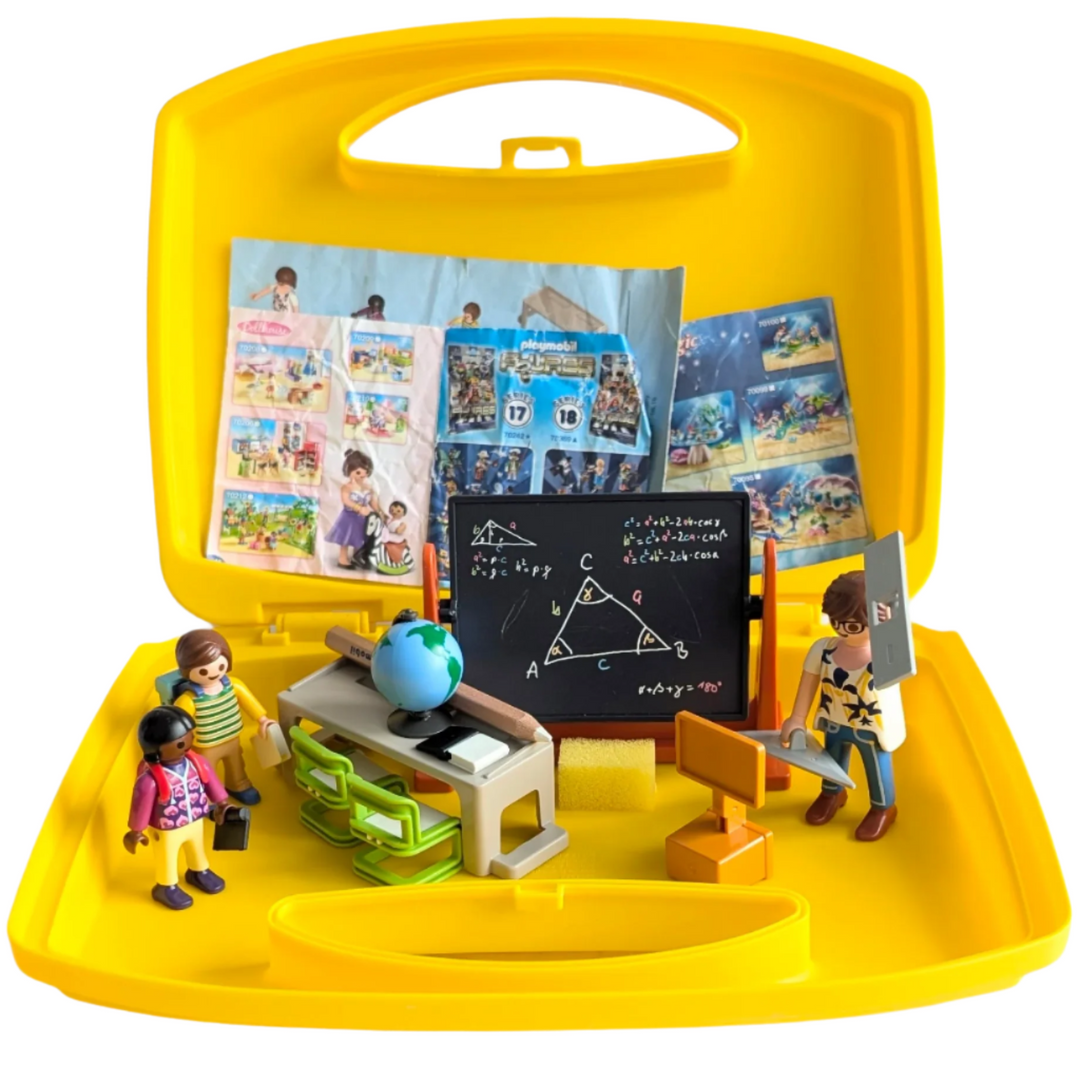 Playmobil, City life school carry case, Social & Emotional Development, Take-along learning fun with the School Carry Case. The travel-friendly playset features a swivelling blackboard, which can be written on using the included pencil. The writing can then be erased using the included sponge. The playset is complete with three figures, furniture and accessories.