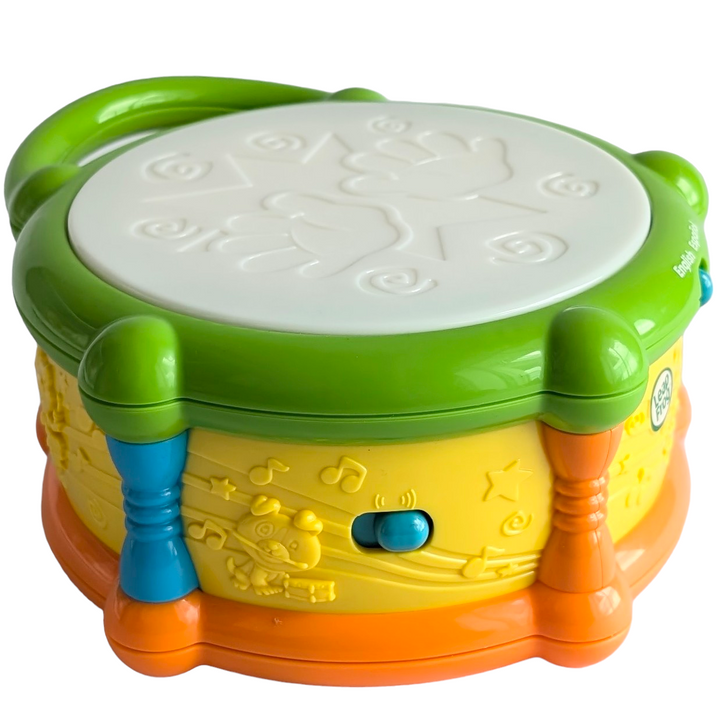 Leapfrog, Learn and Groove Color Play Drum, Cognitive & Motor Skills Development, Tap into learning fun with the Learn & Groove Color Play Drum. As children play along to classical, marching or salsa beats, they will learn about colours, counting and opposites in both English and Spanish.