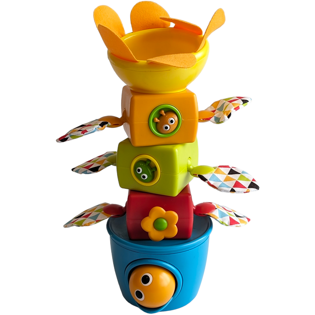 Yookidoo, Tumble Ball Stacker, Cognitive & Motor Skills Development, Five large colorful stackers, each with a gear activity, a flower funnel head with soft petals and crinkly wings, and 3 rattling balls to drop down the center.