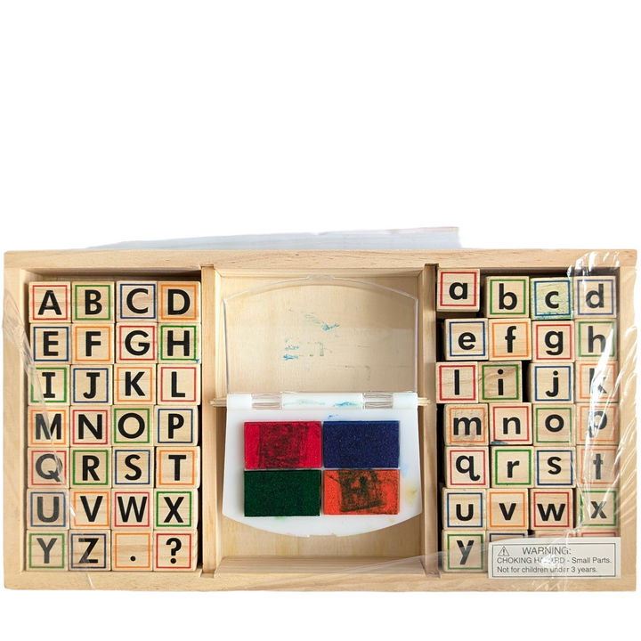 Melissa & Doug, Wooden Alphabet Stamp Set, Sensory & Language Development , With this exquisitely arranged wooden alphabet stamp set, you may write captivating messages. It comes with a 4-color stamp pad, 56 letters (upper and lower case), and punctuation marks. Organise it neatly in the handy wooden storage tray.