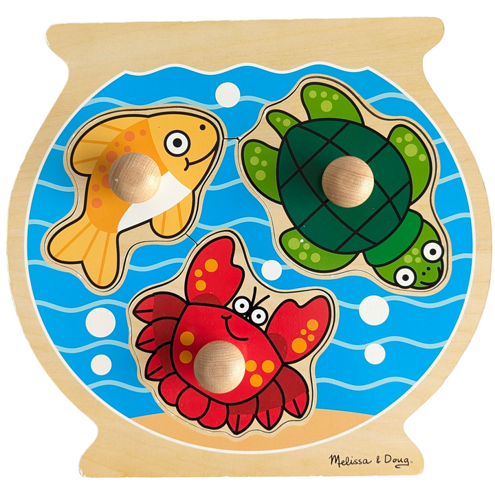 Melissa & Doug, Fishbowl Jumbo Knob Wooden Puzzle, Cognitive & Motor Skills Development , Three content tenants live in a charming fishbowl where you can play puzzles. The fish, turtle, and crab in this extra-thick three-piece wooden puzzle all have large wooden knobs that are simple to hold. Matching, full-color images are displayed beneath every component. An excellent exercise to improve visual perception and hand-eye coordination.