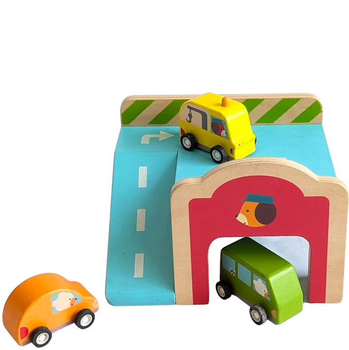 Djeco , Mini Garage , Cognitive & Motor Skills Development, This Djeco mini wooden garage is perfect for little hands to play with.

Made from smooth, polished wood it comes with 3 chunky wooden vehicles.  The wooden garage has 2 floors and the top floor has a ramp leading down to the ground.  Measuring 17 x 11.5 x 15 cm this is an ideal size for young toddlers and the wooden vehicles are easy to hold. 