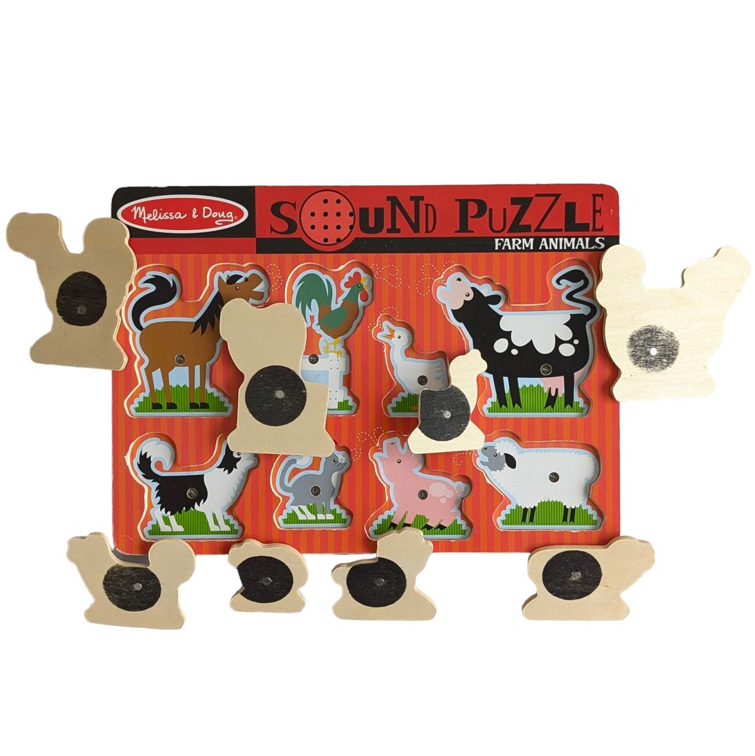 Melissa & Doug, Farm Animals Sound Puzzle, Cognitive & Motor Skills Development , In this eight-piece wooden peg puzzle, each contented farm animal "sounds off" in its own unique voice when its puzzle piece is positioned correctly! With this engaging multisensory puzzle, your child will enjoy listening to all eight noises and viewing the full-color matching pictures underneath the pieces as they practise matching and listening abilities.