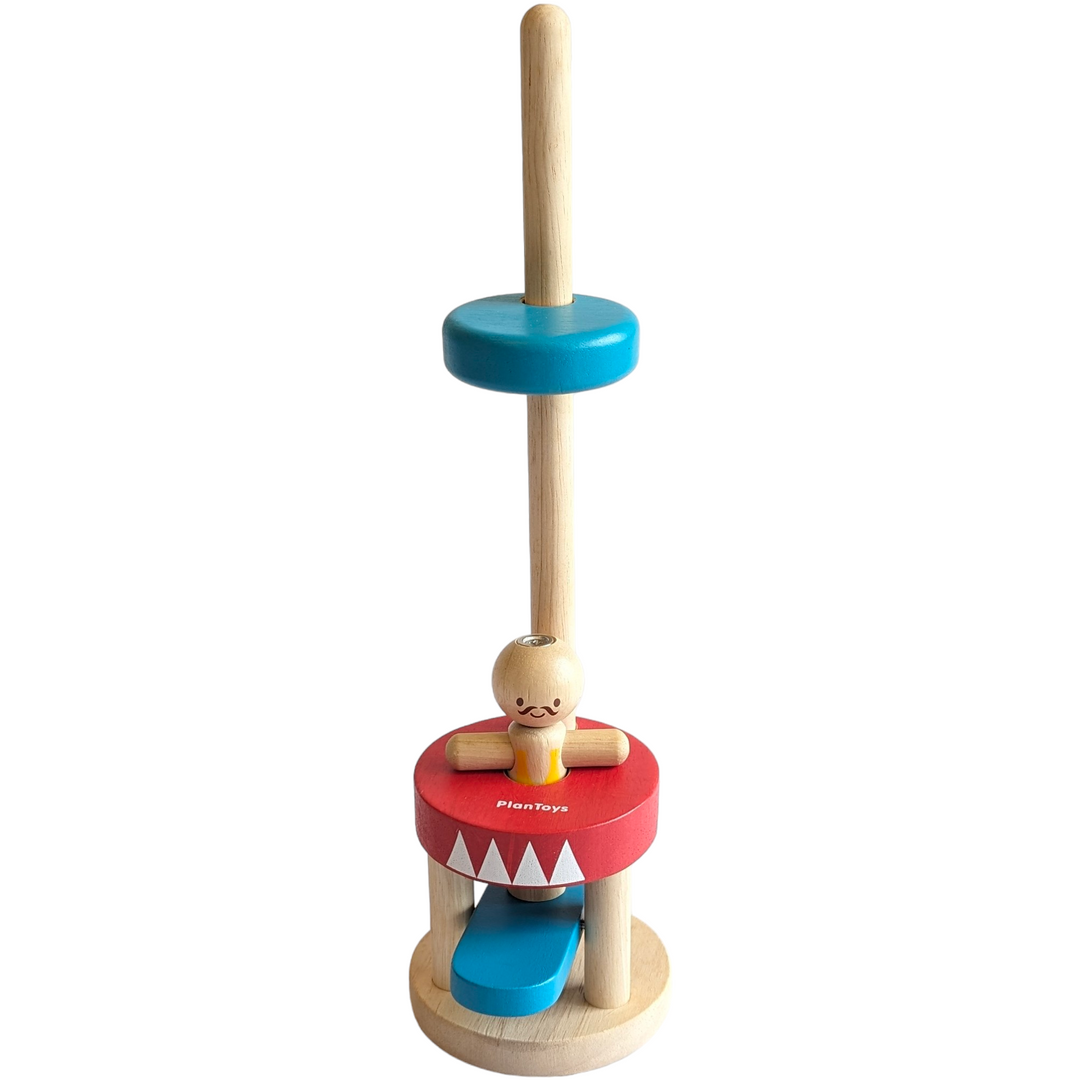 PlanToys, Jumping Acrobat, Cognitive & Motor Skills Development, Let’s have some fun with the Jumping Acrobat! Push the Blue bar down to make the acrobat jump up to the top. This helps enhance observational and experimental skills.