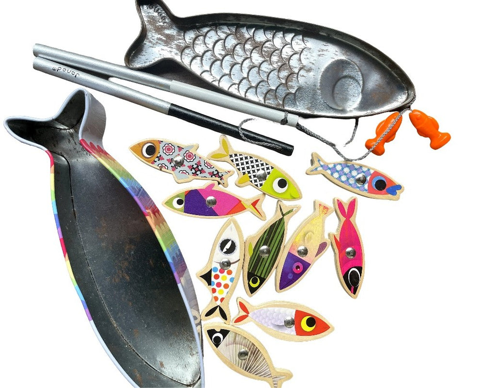 Janod, Sardine Fishing Game, Cognitive & Motor Skills Development, Fishing game composed of 10 funny and colourful sardines, supplied with 2 fishing rods in wood, with a hook in the shape of fish. Heat transfer printing on one side and metal rivet fixed on both sides of the fish for more safety because you cannot take the rivet out. Metal sardine shaped box printed on both sides, embossed on some parts (eyes, scales). Wood: plywood (fish). Fish hook in ABS