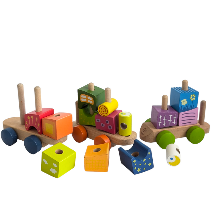 Hape, Fantasia Train Set, Cognitive & Motor Skills Development, Uniquely shaped blocks with enchanting patterns inspire building in a whole new way. Interchangeable train cars add more possibilities.

* This 17-piece block train features bright rainbow colors and patterns, adding fun to block-building and train play.
* The 3 little trains are interchangeable with holes and pegs. Kids can pull the long trains with wheels easily.
* There's no right or wrong way to play with these shapes. Encourage your child 